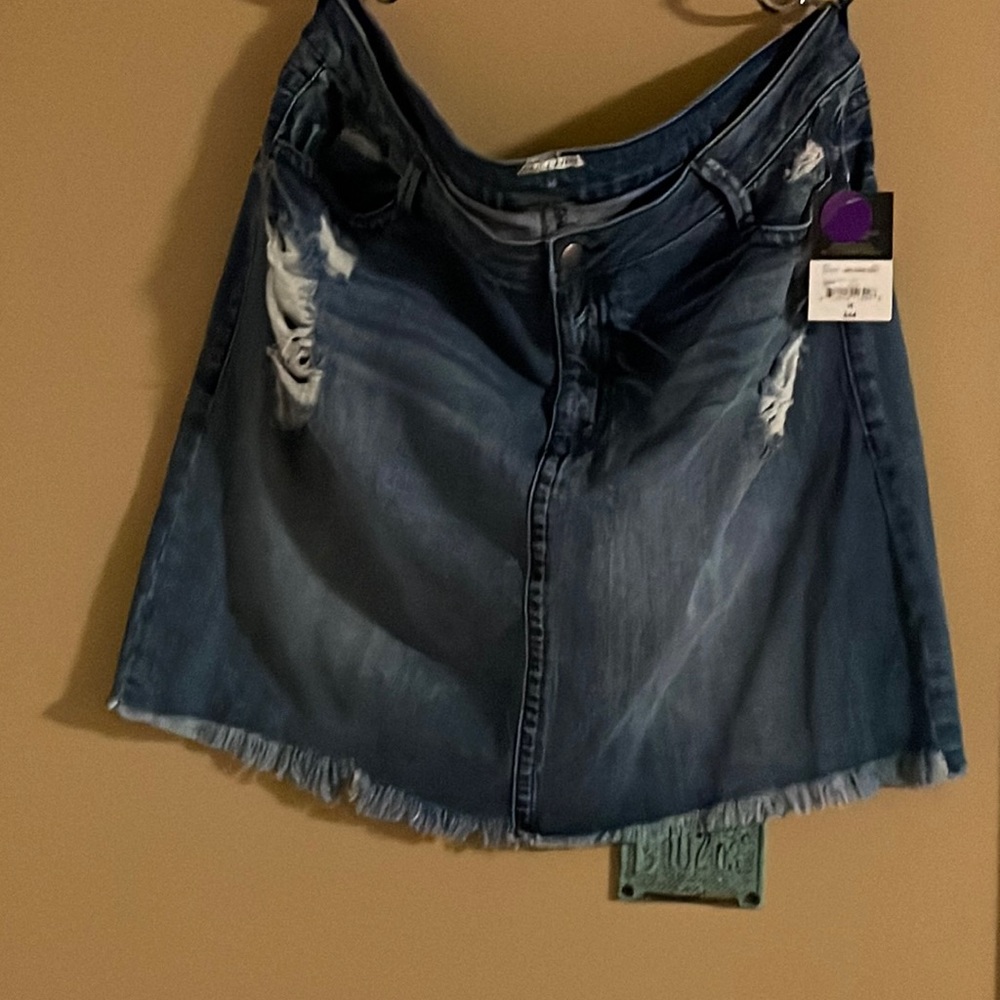 Never worn distressed mini skirt denim